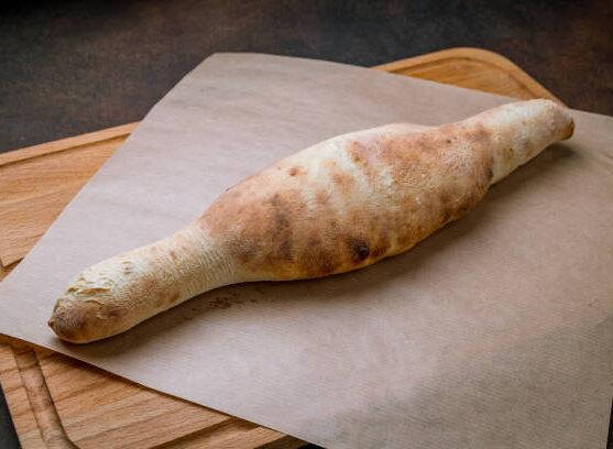 Georgian bread lavash shoti on brown concrete table Georgian bread lavash shoti on brown concrete table