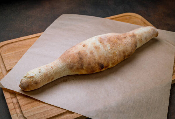 Georgian bread lavash shoti on brown concrete table Georgian bread lavash shoti on brown concrete table